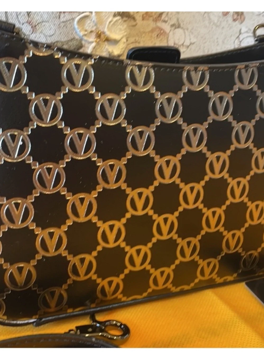 Valentino hand shoulder
